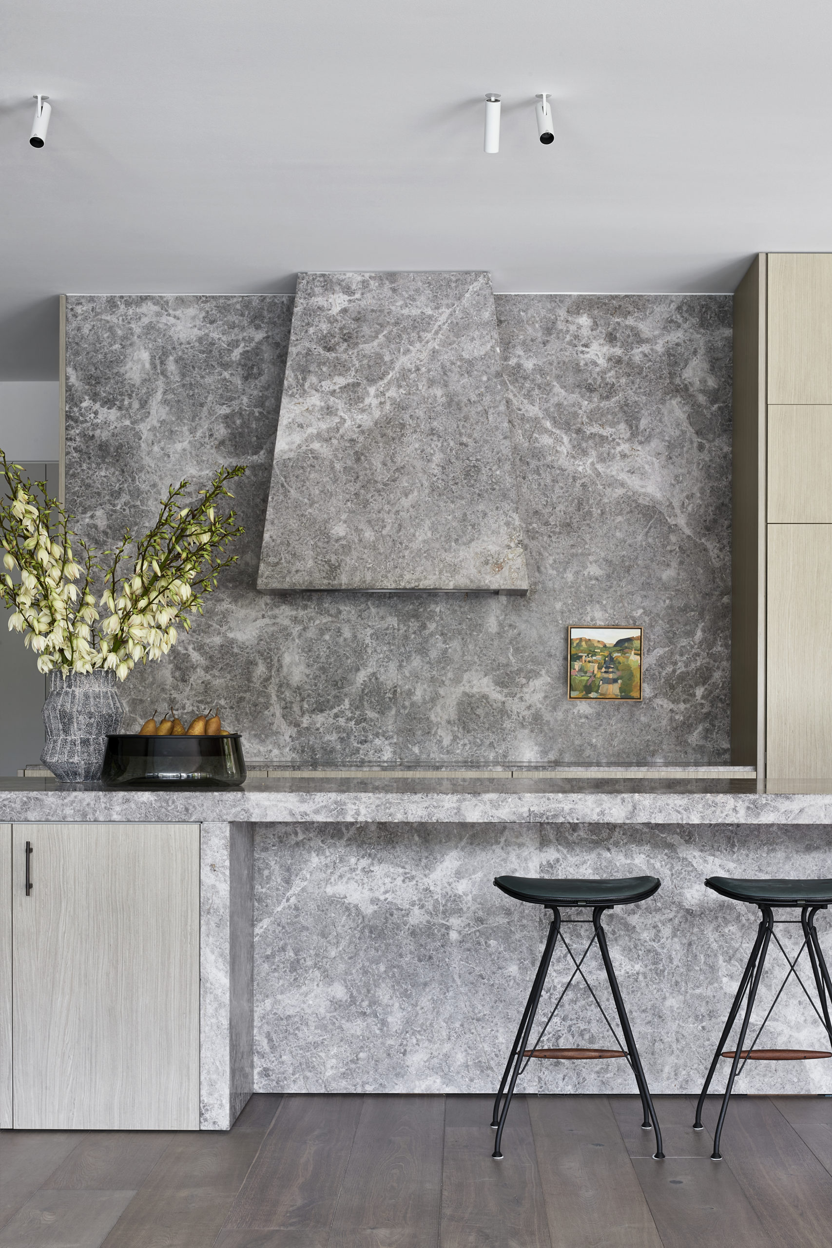 The beautiful kitchen of Evergreen House by Robson Rak featuring Otto XIII Smoked engineered European oak flooring and stormy-grey stone