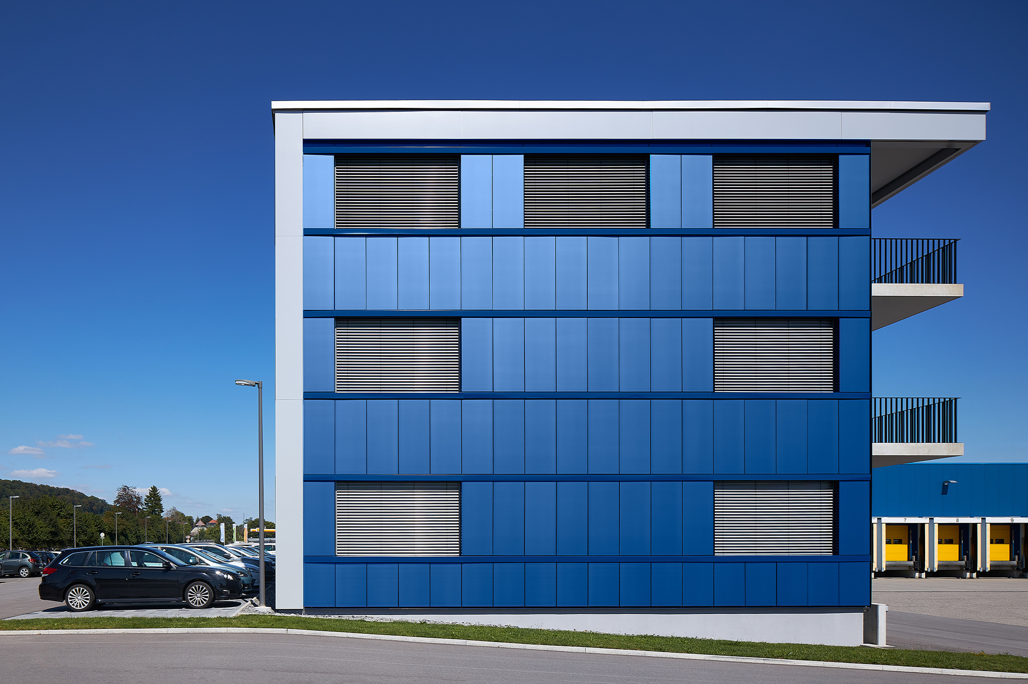 Customised blue SKALA solar panels at Volg